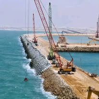 Dakhla Atlantic Port breakwater construction cranes
